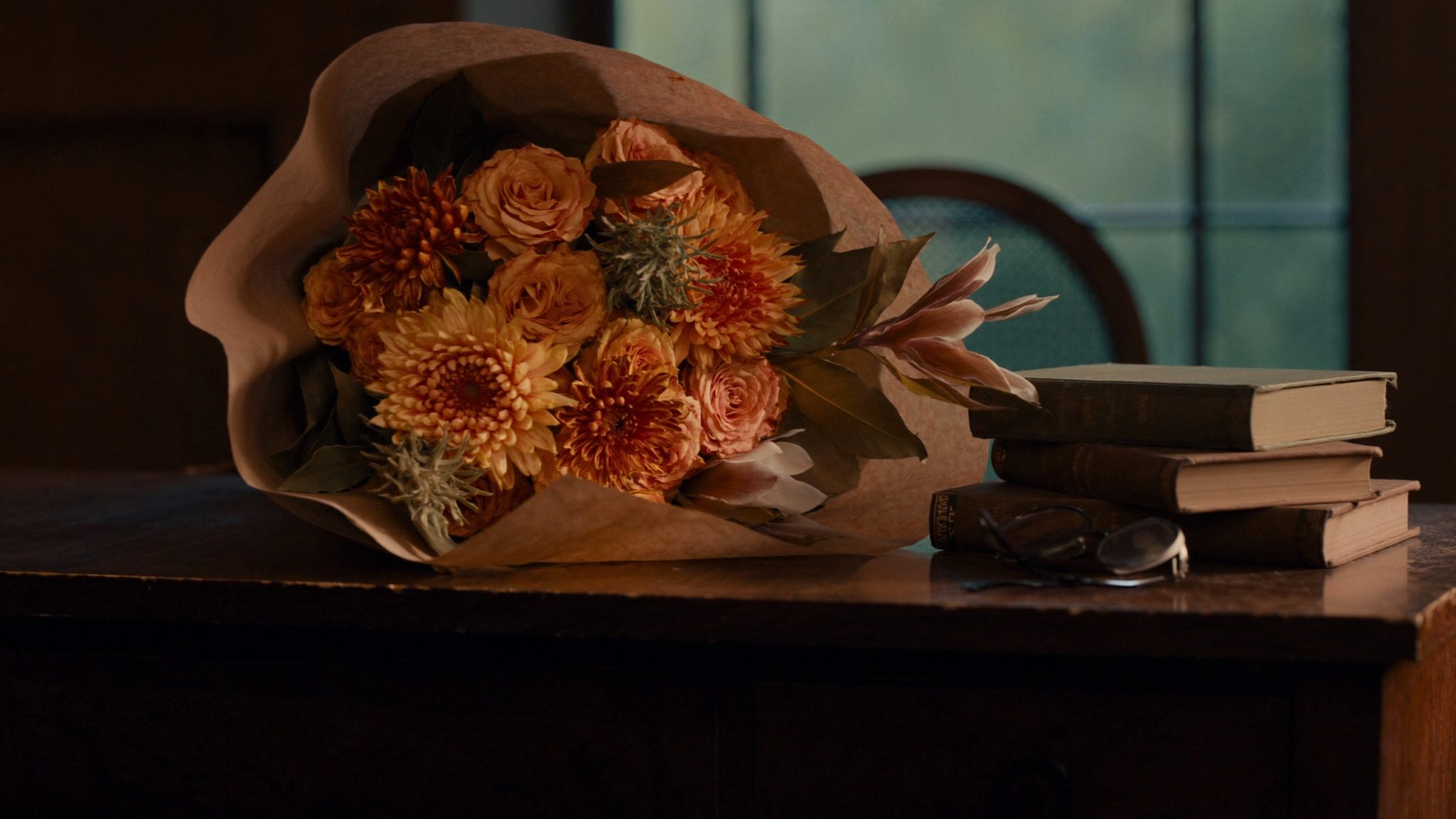 Autumn bouquet with orange roses and chrysanthemums